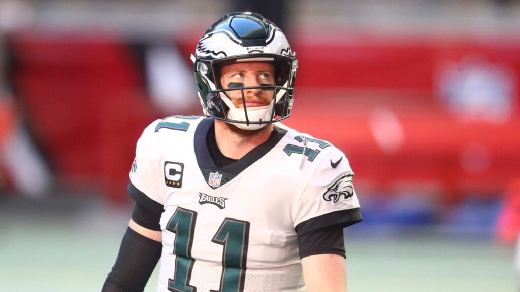 Dec 20, 2020; Glendale, Arizona, USA; Philadelphia Eagles quarterback Carson Wentz (11) reacts prior to the game against the Arizona Cardinals at State Farm Stadium.