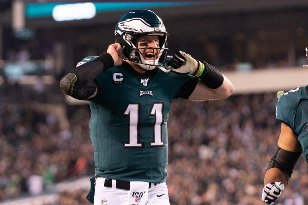Dec 22, 2019; Philadelphia, Pennsylvania, USA; Philadelphia Eagles quarterback Carson Wentz (11) reacts after his touchdown pass against the Dallas Cowboys during the first quarter at Lincoln Financial Field.
