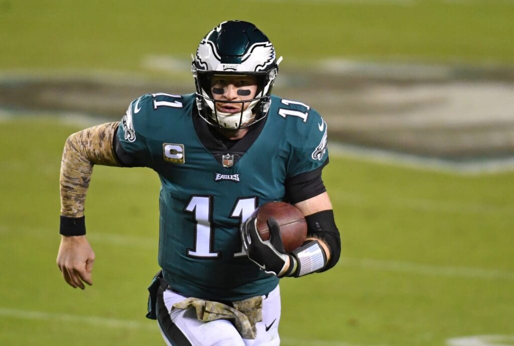 Nov 1, 2020; Philadelphia, Pennsylvania, USA; Philadelphia Eagles quarterback Carson Wentz (11) runs with the football against the Dallas Cowboys at Lincoln Financial Field.