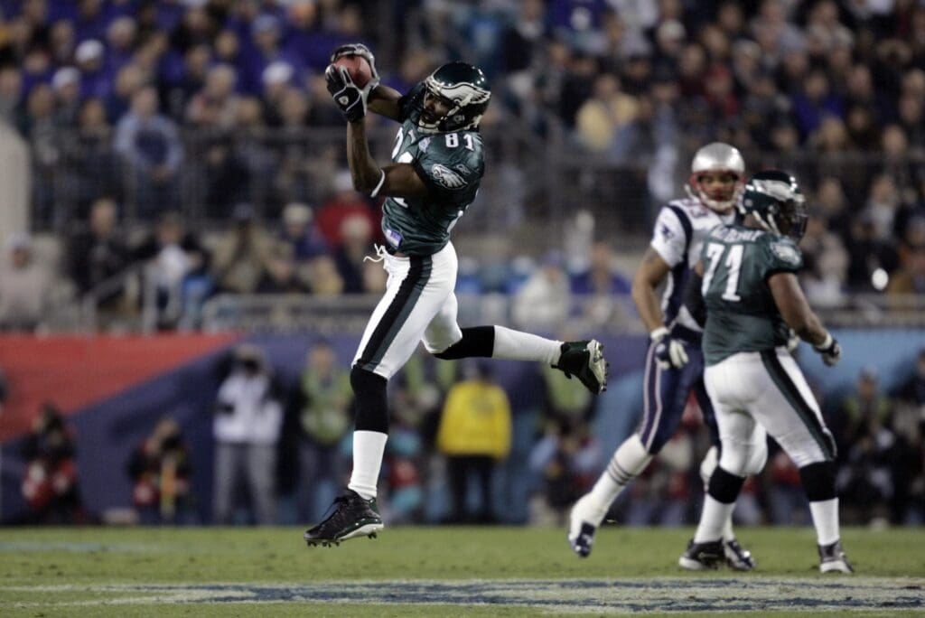 Feb 06, 2005; Jacksonville, FL, USA; Philadelphia Eagles receiver Terrell Owens (81) catches a pass against the New England Patriots during Super Bowl XXXIX at Alltel Stadium. The Patriots defeated the Eagles 24-21.