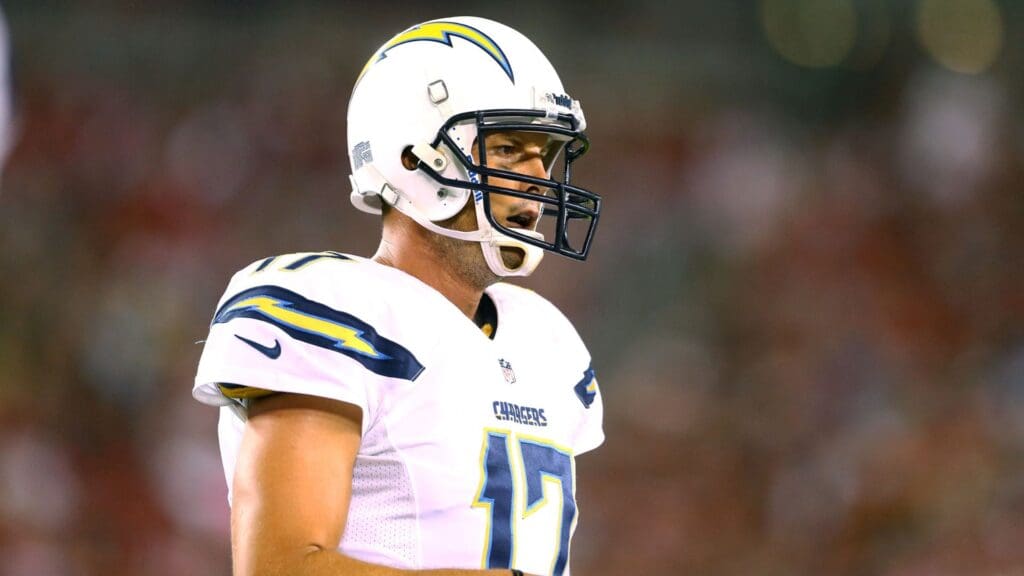 Aug. 24, 2013; Glendale, AZ, USA: San Diego Chargers quarterback Philip Rivers (17) against the Arizona Cardinals during a preseason game at University of Phoenix Stadium.
