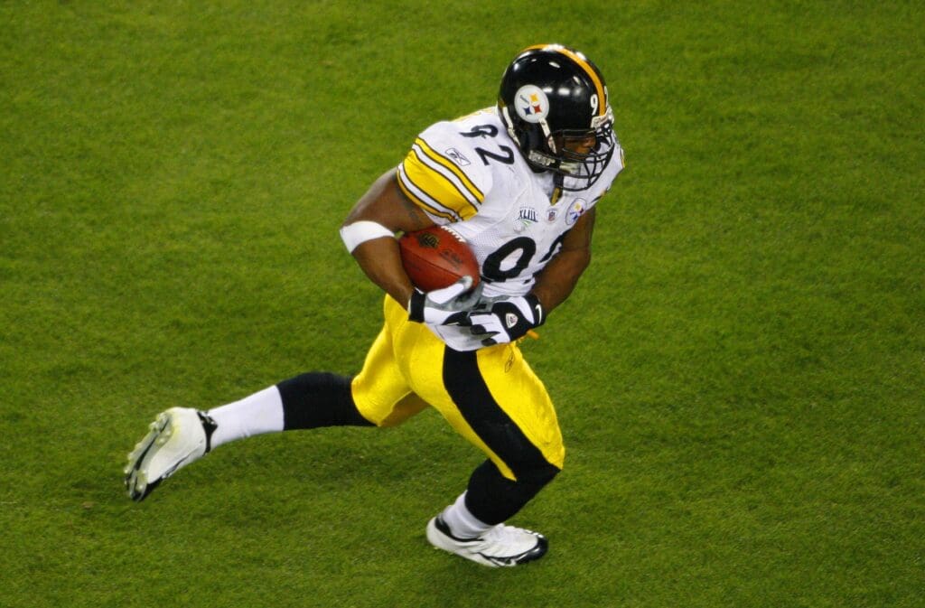 Feb 1, 2009; Tampa, FL, USA; Pittsburgh Steelers linebacker James Harrison (92) scores a touchdown after intercepting the ball during the second quarter of Super Bowl XLIII against the Arizona Cardinals at Raymond James Stadium.