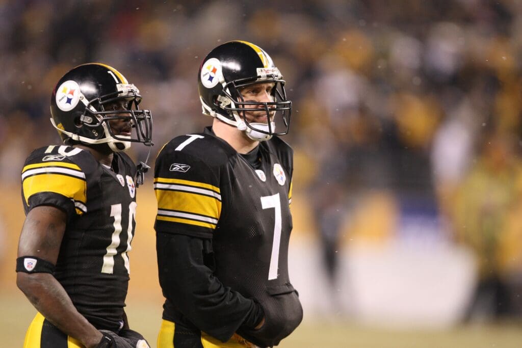 Jan 18, 2009; Pittsburgh, PA, USA; Pittsburgh Steelers quarterback Ben Roethlisberger (7) with receiver Santonio Holmes (10) during a timeout against the Baltimore Ravens in the AFC Championship game at Heinz Field. The Steelers beat Ravens 23-14.