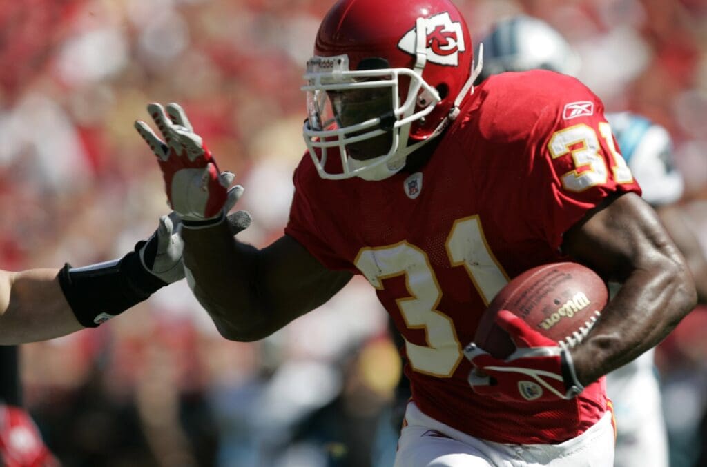Sept 19, 2004; Kansas City, MO, USA; Priest Holmes #31of the Kansas City Chiefs rushes against the Carolina Panthers at Arrowhead Stadium. The Panthers beat 28-17.