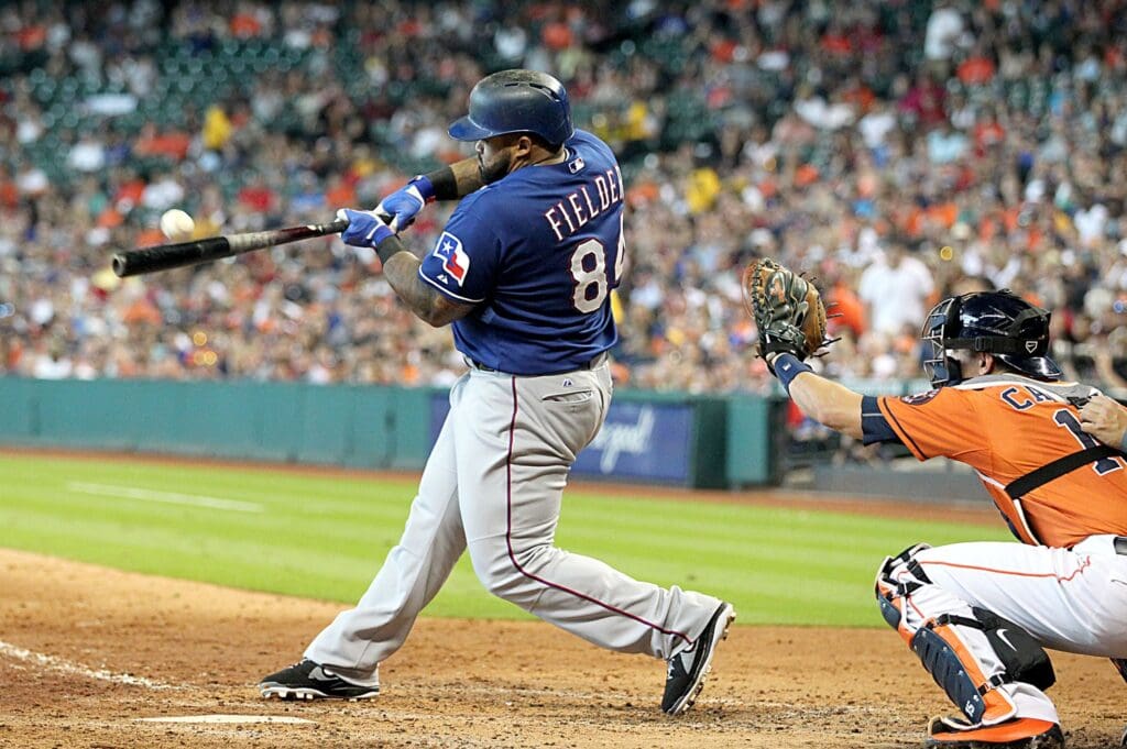 Sep 26, 2015; Houston, TX, USA; Texas Rangers designated hitter Prince Fielder (84) hits a single against the Houston Astros in the fifth inning at Minute Maid Park.