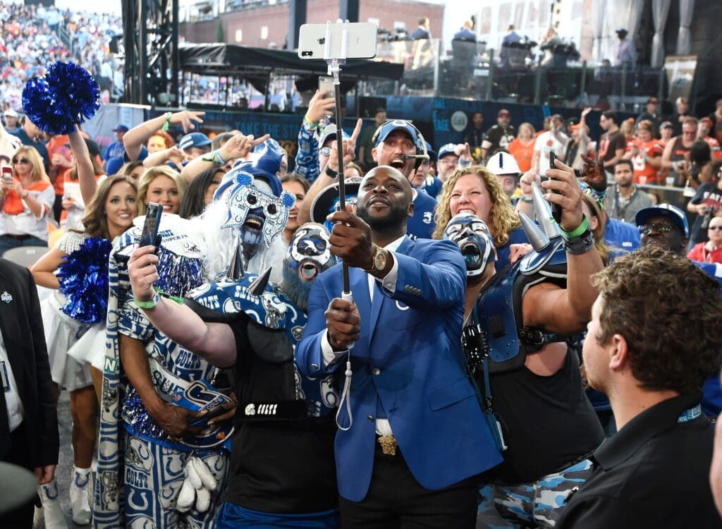 Reggie Wayne does a selfie with Colts fans during the second day of the NFL Draft Friday, April 26, 2019, in Nashville, Tenn. Gw42040