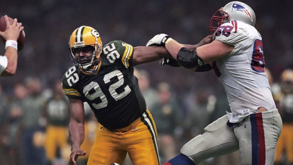 Jan 26, 1997; New Orleans, LA, USA; FILE PHOTO; Green Bay Packers defensive end Reggie White (92) battles New England Patriots tackle Max Lane (68) during Super Bowl XXXI at the Superdome. The Packers defeated the Patriots 35-21