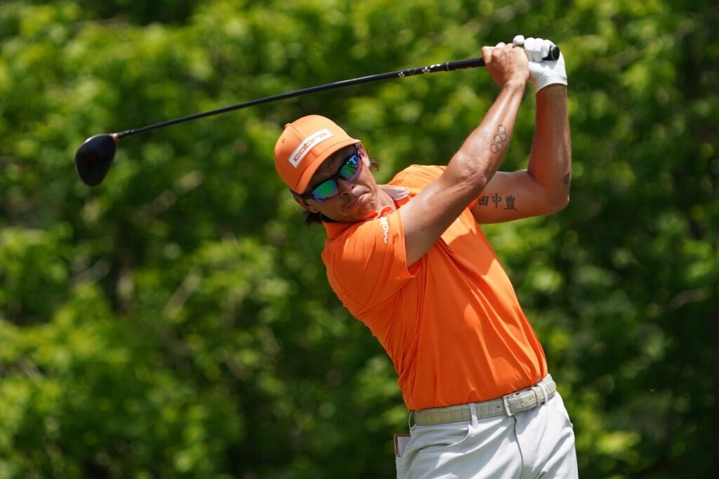 May 25, 2025; Fort Worth, Texas, USA; Rickie Fowler plays his shot from the sixth tee during the final round of the Charles Schwab Challenge golf tournament.