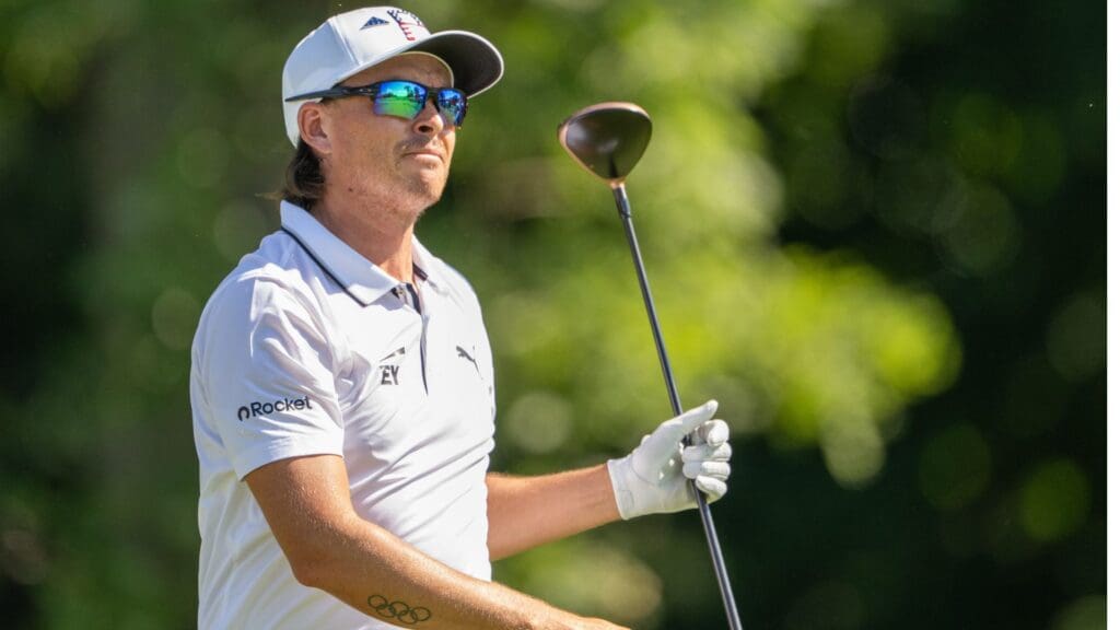 Jul 4, 2025; Silvis, Illinois, USA; Rickie Fowler tees off on the 13th hole during the second round of the John Deere Classic golf tournament.