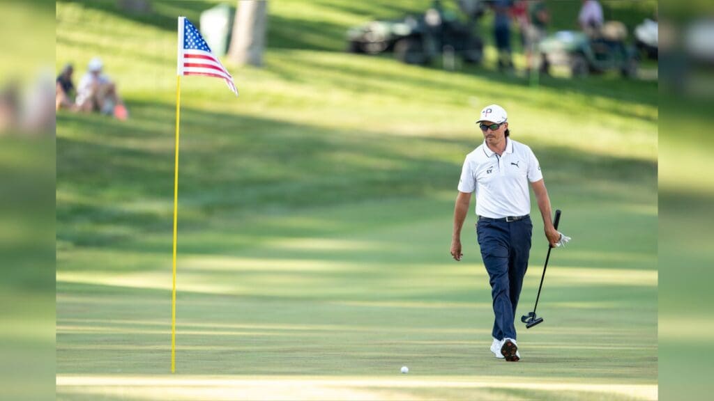 Jul 4, 2025; Silvis, Illinois, USA; Rickie Fowler walks onto the 18th green during the second round of the John Deere Classic golf tournament.