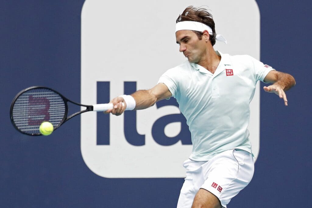 Mar 25, 2019; Miami Gardens, FL, USA; Roger Federer of Switzerland hits a forehand against Filip Krajinovic of Serbia (not pictured) in the third round of the Miami Open at Miami Open Tennis Complex.