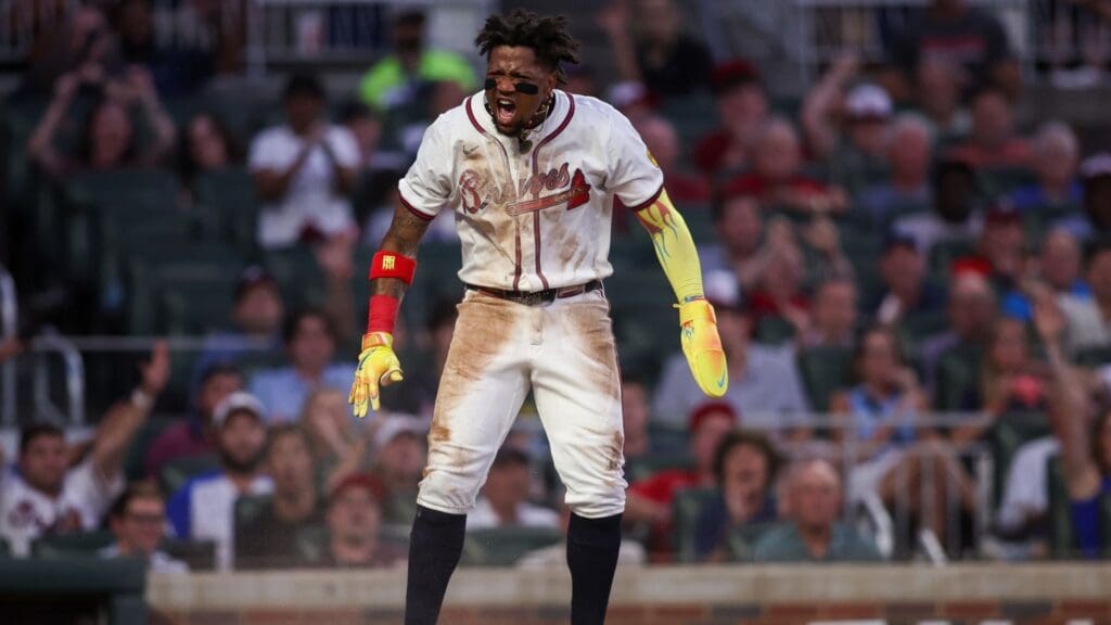 Jul 21, 2025; Atlanta, Georgia, USA; Atlanta Braves right fielder Ronald Acuna Jr. (13) celebrates after scoring a run against the San Francisco Giants in the fourth inning at Truist Park.