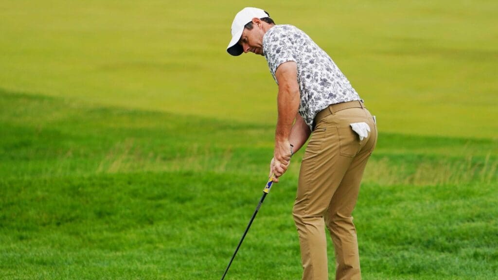 Jun 16, 2022; Brookline, Massachusetts, USA; Rory McIlroy putts on the 12th green during the first round of the U.S. Open golf tournament. 