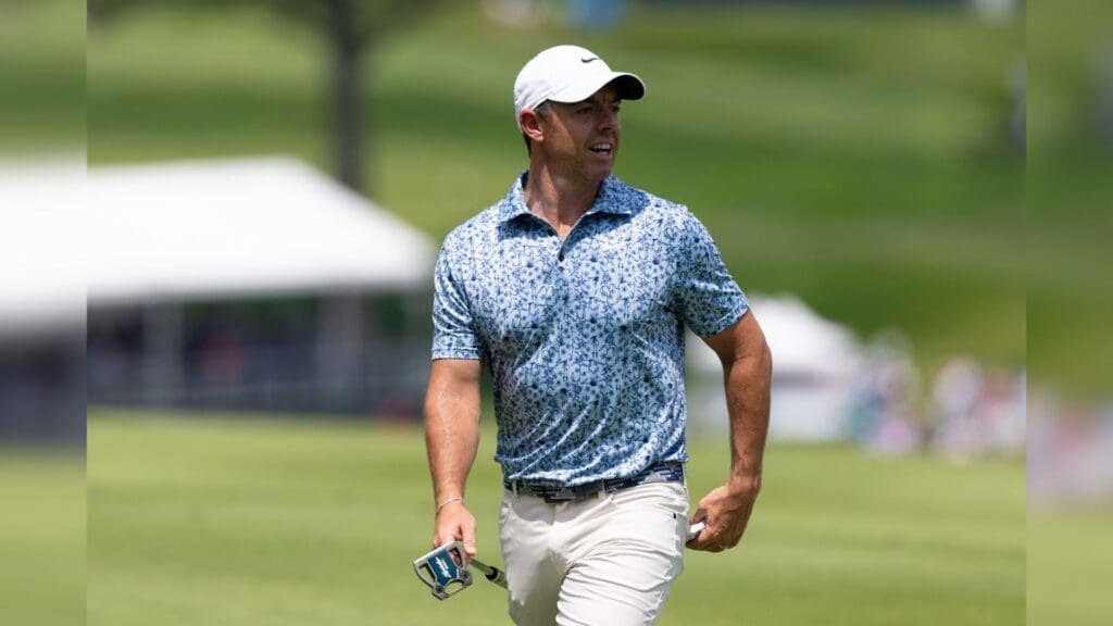 Jun 21, 2025; Cromwell, Connecticut, USA; Rory McIlroy looks on after playing his second shot on the second hole during the third round of the Travelers Championship golf tournament.