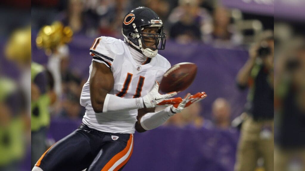 Jan 1, 2012; Minneapolis, MN, USA; Chicago Bears wide receiver Roy Williams (11) catches a touchdown pass against the Minnesota Vikings in the second quarter at the Metrodome.