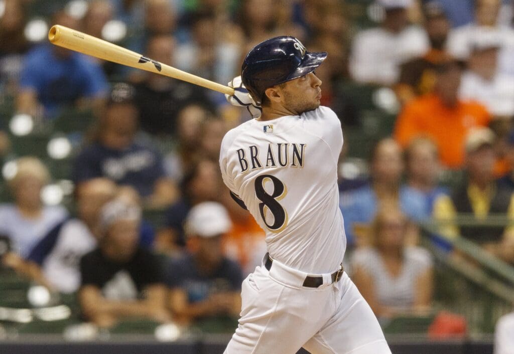 Sep 3, 2019; Milwaukee, WI, USA; Milwaukee Brewers left fielder Ryan Braun (8) hits an RBI single during the third inning against the Houston Astros at Miller Park.