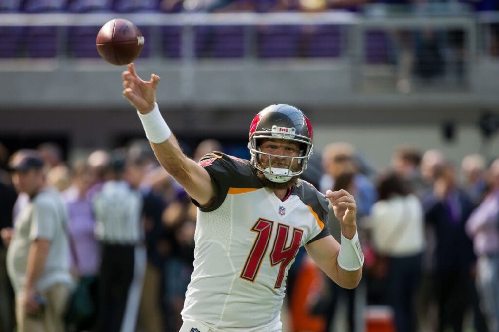 Sep 24, 2017; Minneapolis, MN, USA; Tampa Bay Buccaneers quarterback Ryan Fitzpatrick (14) warms up before the game against the Minnesota Vikings at U.S. Bank Stadium.