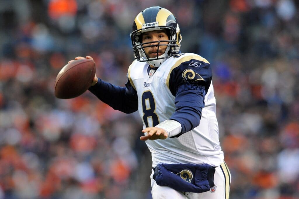 Nov 28, 2010; Denver, CO, USA; St. Louis Rams quarterback Sam Bradford (8) prepares to throw the football in the first half against the Denver Broncos at Invesco Field