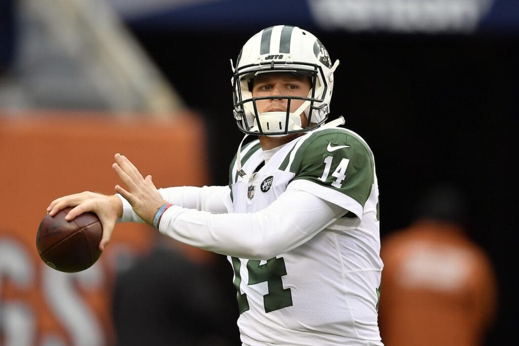 Oct 28, 2018; Chicago, IL, USA; New York Jets quarterback Sam Darnold (14) warms up before the game against the Chicago Bears at Soldier Field.