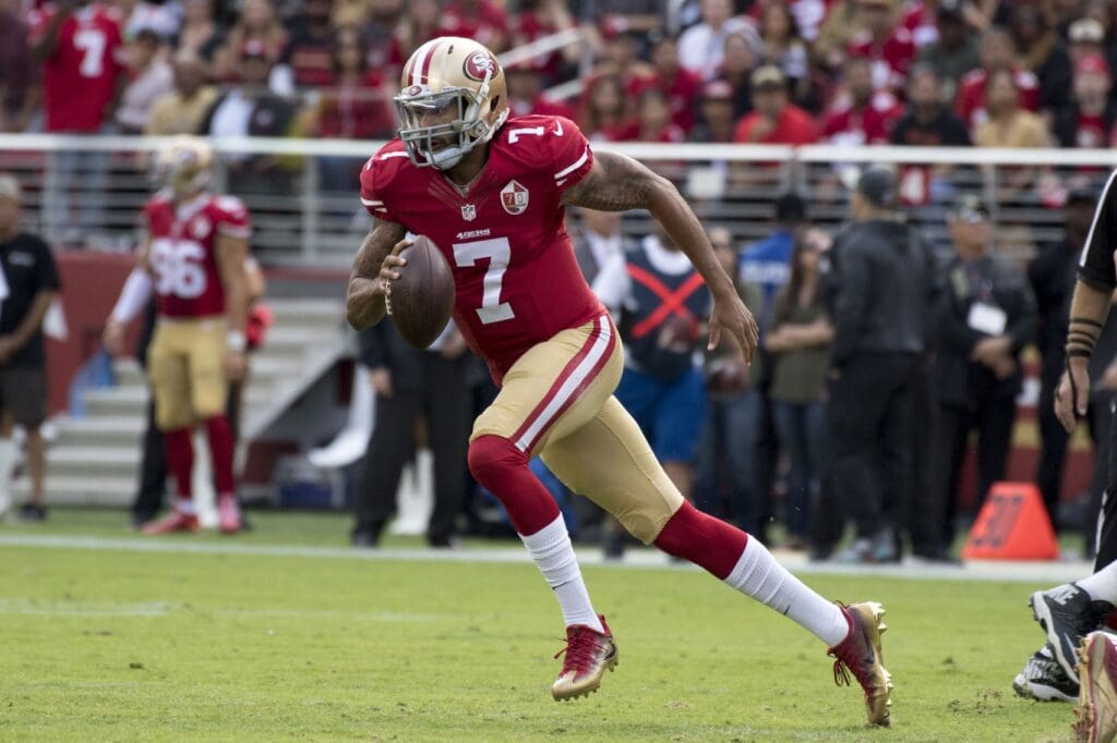 November 6, 2016; Santa Clara, CA, USA; San Francisco 49ers quarterback Colin Kaepernick (7) runs with the football against the New Orleans Saints during the first quarter at Levi's Stadium. 