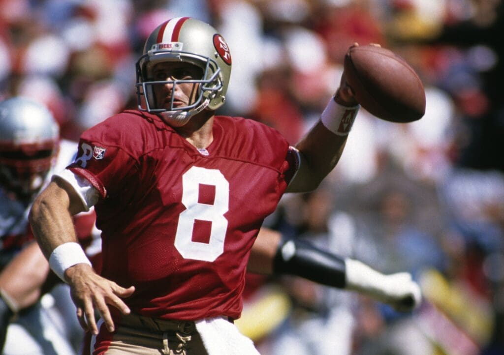 Sep 17, 1995; San Francisco, CA, USA; FILE PHOTO; San Francisco 49ers quarterback Steve Young (8) in action against the New England Patriots at 3Com Park.
