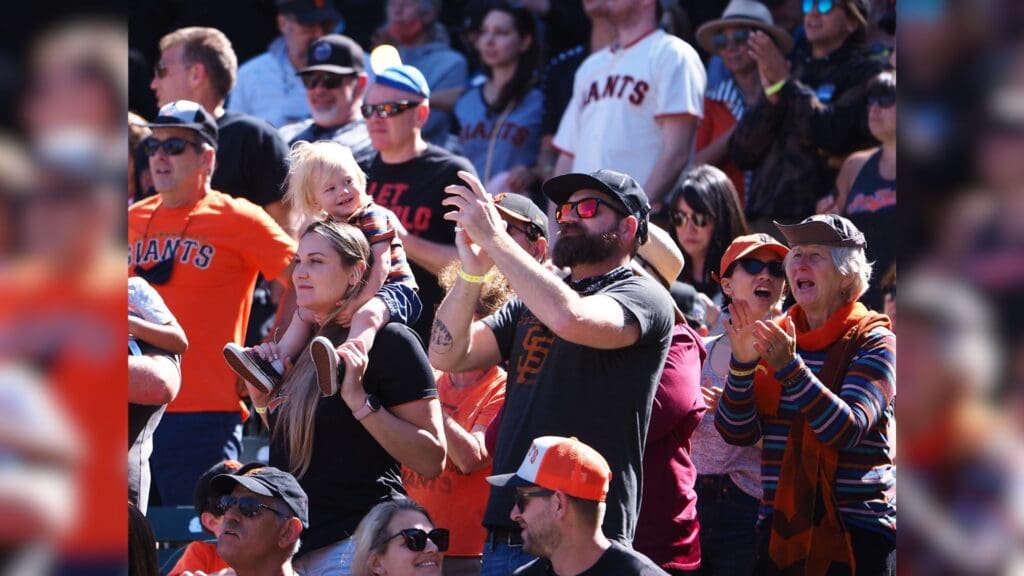 Jun 6, 2021; San Francisco, California, USA; San Francisco Giants fans cheer at the bottom of the ninth inning against the Chicago Cubs at Oracle Park.
