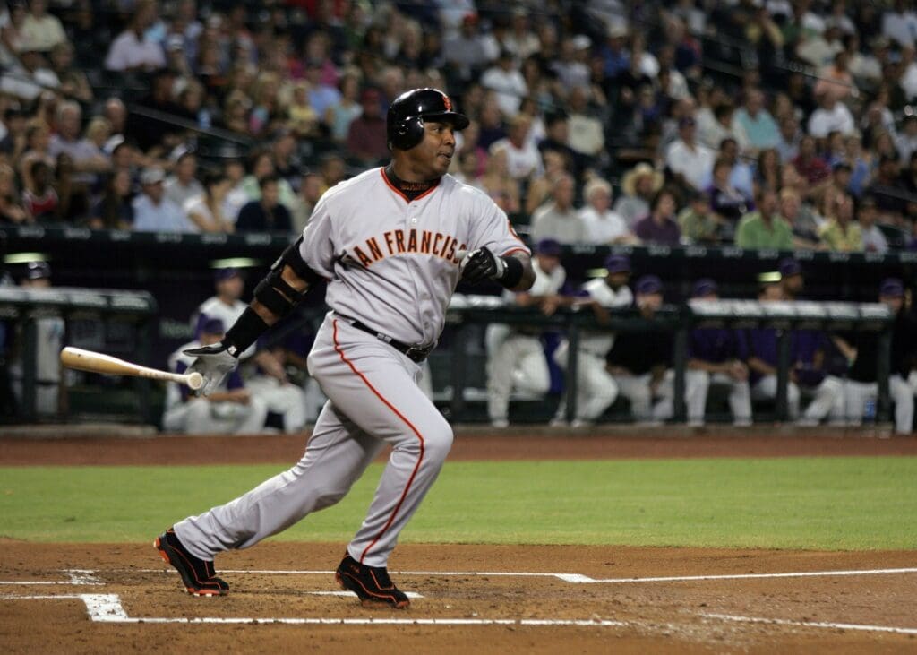 Aug 7, 2006; Phoenix, AZ, USA; San Francisco Giants left fielder (25) Barry Bonds hits an rbi ground out during the first inning against the Arizona Diamondbacks at Chase Field.