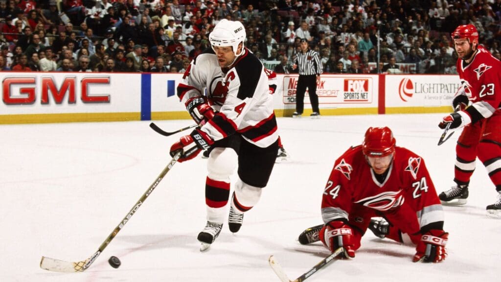 Apr 15, 2001; East Rutherford, NJ, USA; FILE PHOTO; New Jersey Devils defensemen Scott Stevens (4) in action against Carolina Hurricanes left wing Sami Kapanen (24) at Continental Airlines Arena.