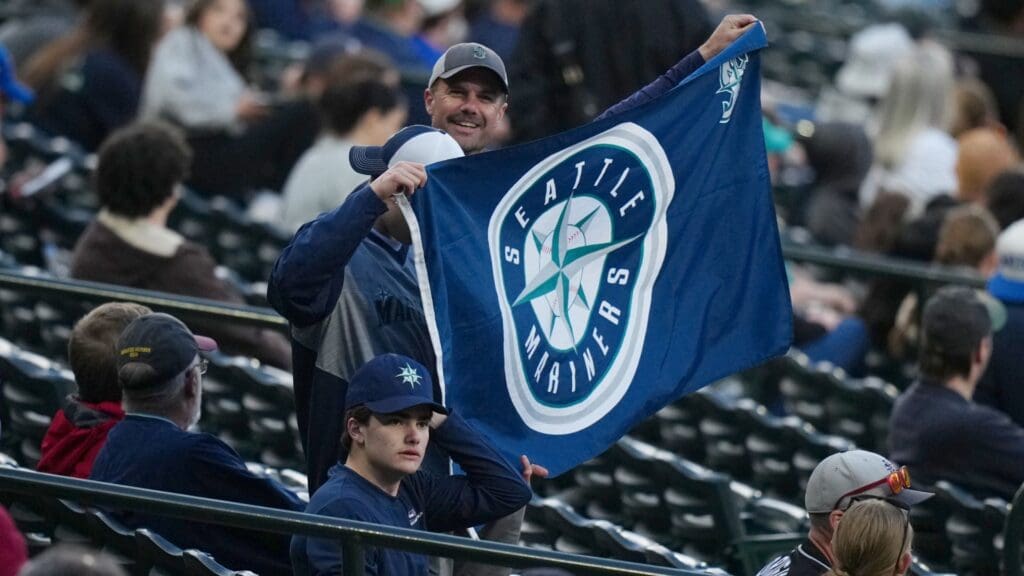 Apr 21, 2024; Denver, Colorado, USA; Seattle Mariners fans cheer in the fifth inning against the Colorado Rockies at Coors Field.