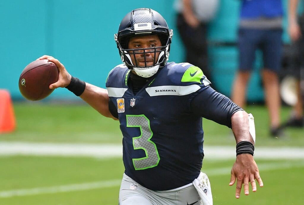Oct 4, 2020; Miami Gardens, Florida, USA; Seattle Seahawks quarterback Russell Wilson (3) attempts a pass against the Miami Dolphins during the first half at Hard Rock Stadium.