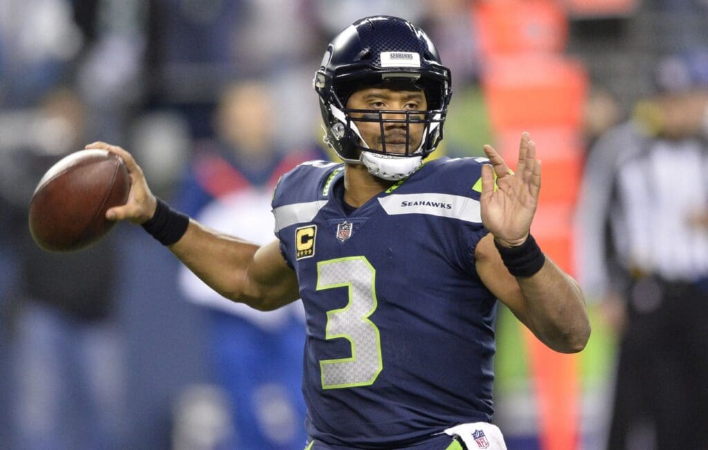 Dec 3, 2017; Seattle, WA, USA; Seattle Seahawks quarterback Russell Wilson (3) passes the ball against the Philadelphia Eagles during the second half at CenturyLink Field. Seattle defeated Philadelphia 24-10.