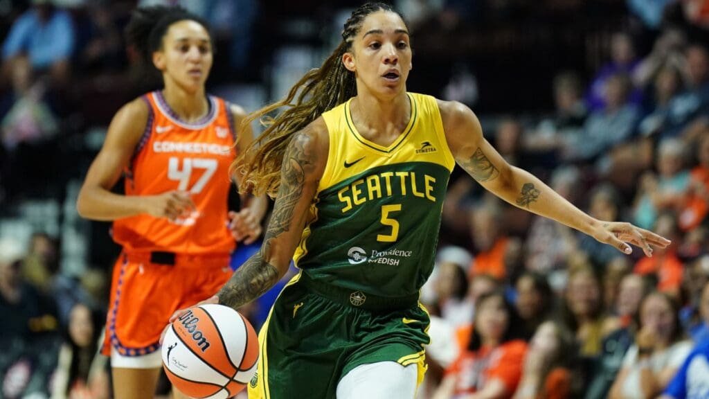 Jul 28, 2025; Uncasville, Connecticut, USA; Seattle Storm forward Gabby Williams (5) returns the ball against the Connecticut Sun in the first half at Mohegan Sun Arena.