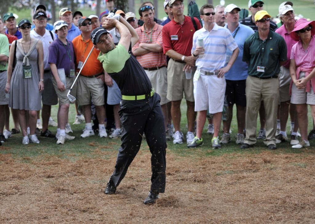 Apr 11, 2013; Augusta, GA, USA; Sergio Garcia hits a shot from the pine straw on the 17th hole during the first round of the 2013 The Masters golf tournament at Augusta National Golf Club.