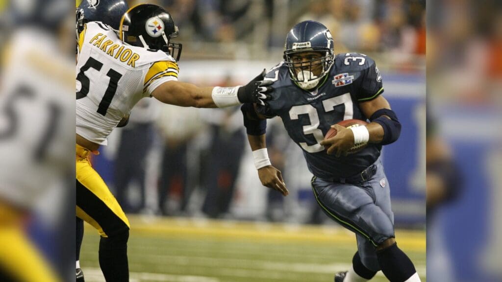 Feb 5, 2006; Detroit, MI, USA; Seattle Seahawks running back (37) Shaun Alexander outruns Pittsburgh Steelers linebacker (51) James Farrior in the third quarter of Super Bowl XL at Ford Field.