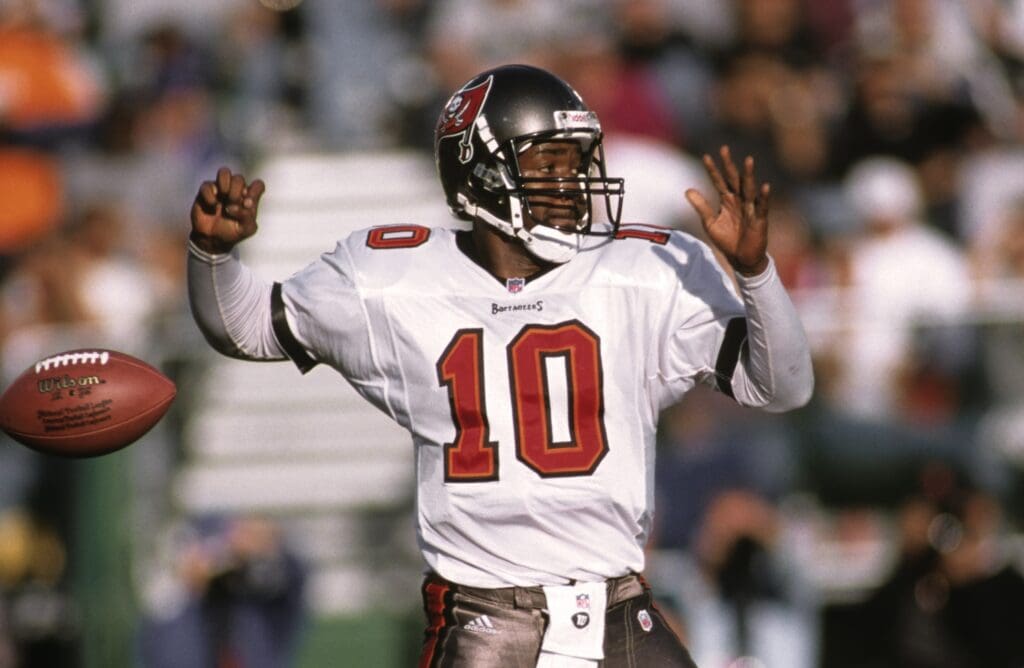 Dec 19, 1999; Oakland, CA, USA; FILE PHOTO; Tampa Bay Buccaneers quarterback Shaun King (10) loses the ball against the Oakland Raiders at Oakland-Alameda County Coliseum.