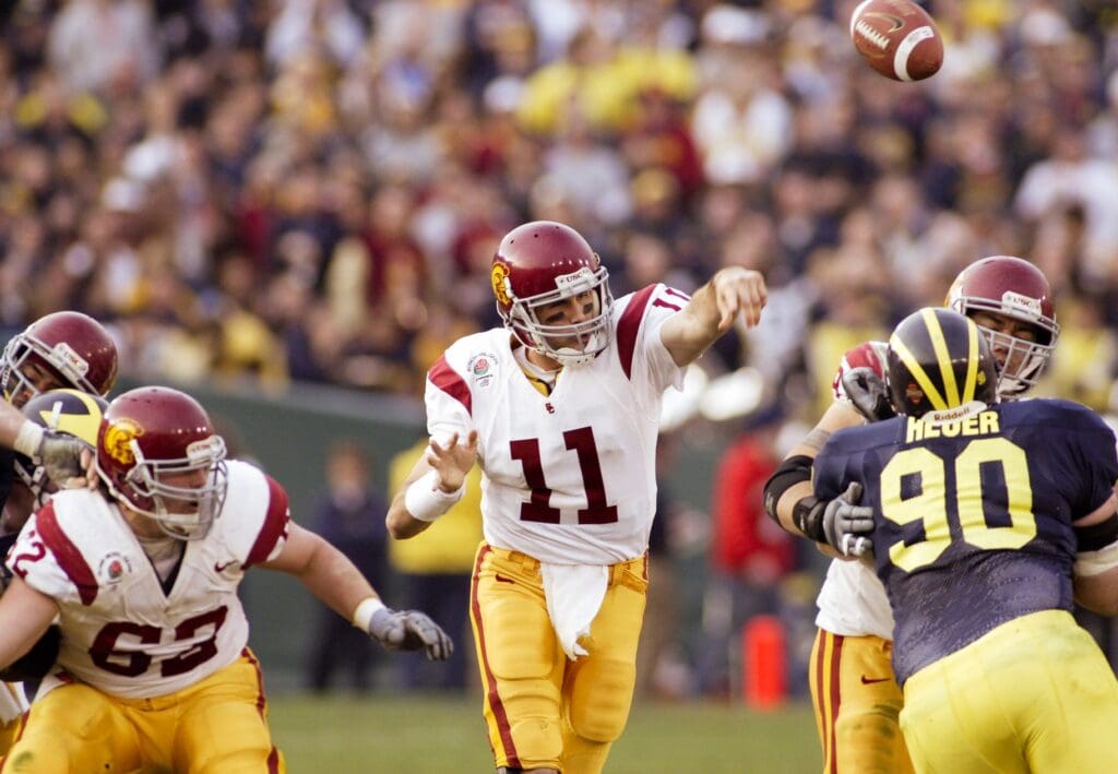 Jan 1, 2004; Pasadena, CA, USA: FILE PHOTO; Southern California Trojans quarterback Matt Leinart (11) in action against the Michigan Wolverines during the 2004 Rose Bowl at the Rose Bowl. The Trojans defeated the Wolverines 28-14.