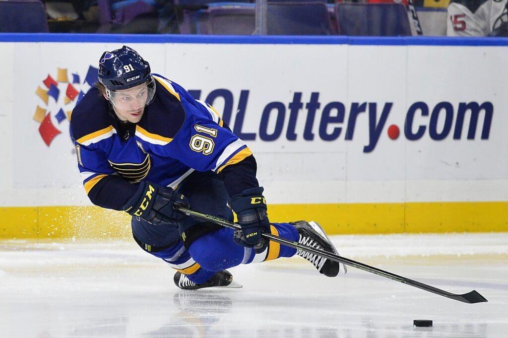 Feb 12, 2019; St. Louis, MO, USA; St. Louis Blues right wing Vladimir Tarasenko (91) falls to the ice as he handles the puck during the third period against the New Jersey Devils at Enterprise Center.