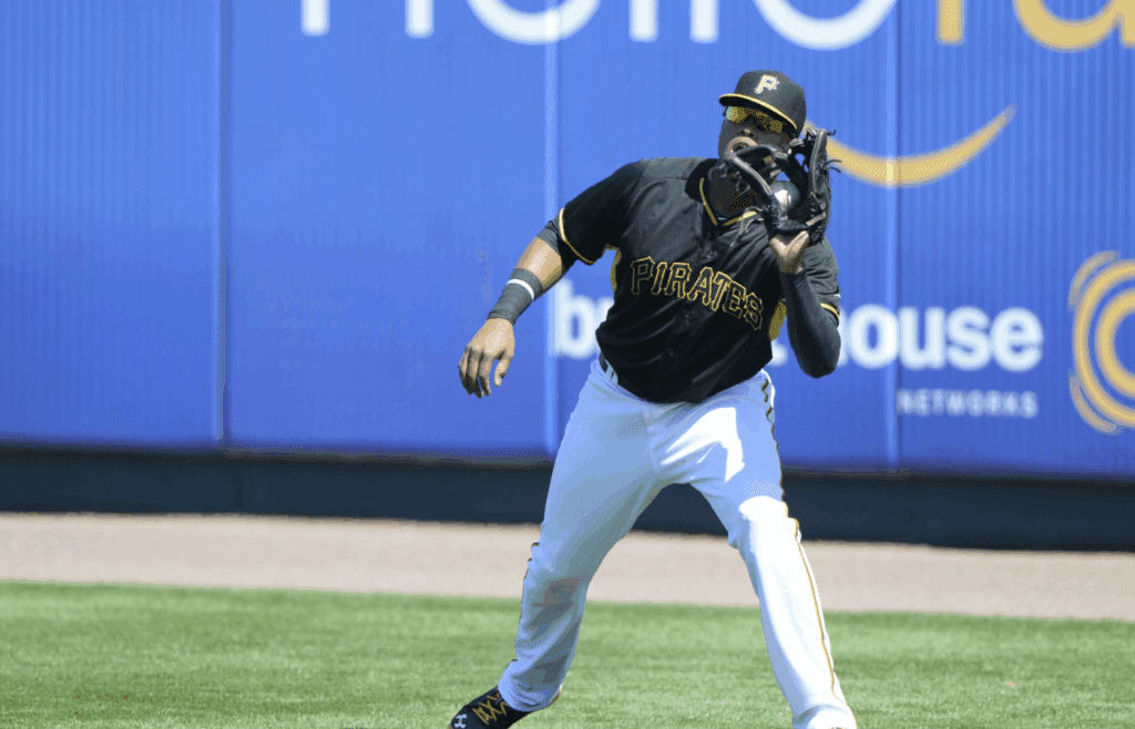 Mar 4, 2015; Bradenton, FL, USA; Pittsburgh Pirates infielder Steve Lombardozzi (23) catches a line drive during the second inning of a spring training baseball game against the Toronto Blue Jays at McKechnie Field. 