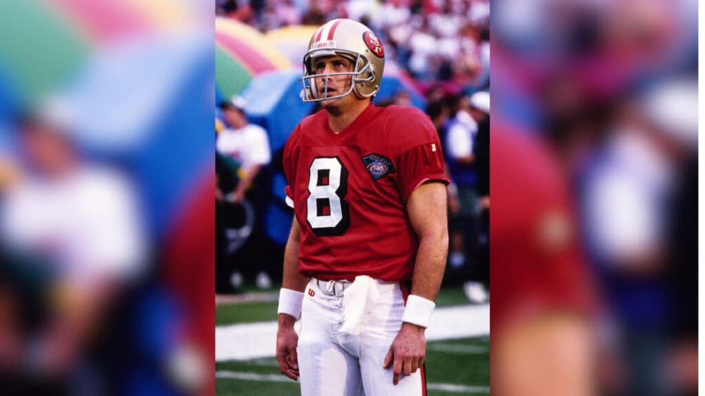 Jan 29, 1995; Miami, FL, USA; FILE PHOTO; San Francisco 49ers quarterback Steve Young (8) warms up on the field prior to Super Bowl XXIX against the San Diego Chargers at Joe Robbie Stadium. The 49ers defeated the Chargers 49-26.