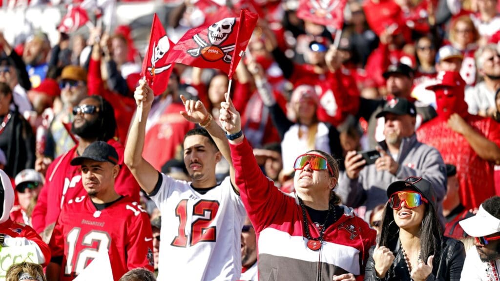 Jan 23, 2022; Tampa, Florida, USA; Tampa Bay Buccaneers fans cheer during the first half against the Los Angeles Rams in a NFC Divisional playoff football game at Raymond James Stadium.