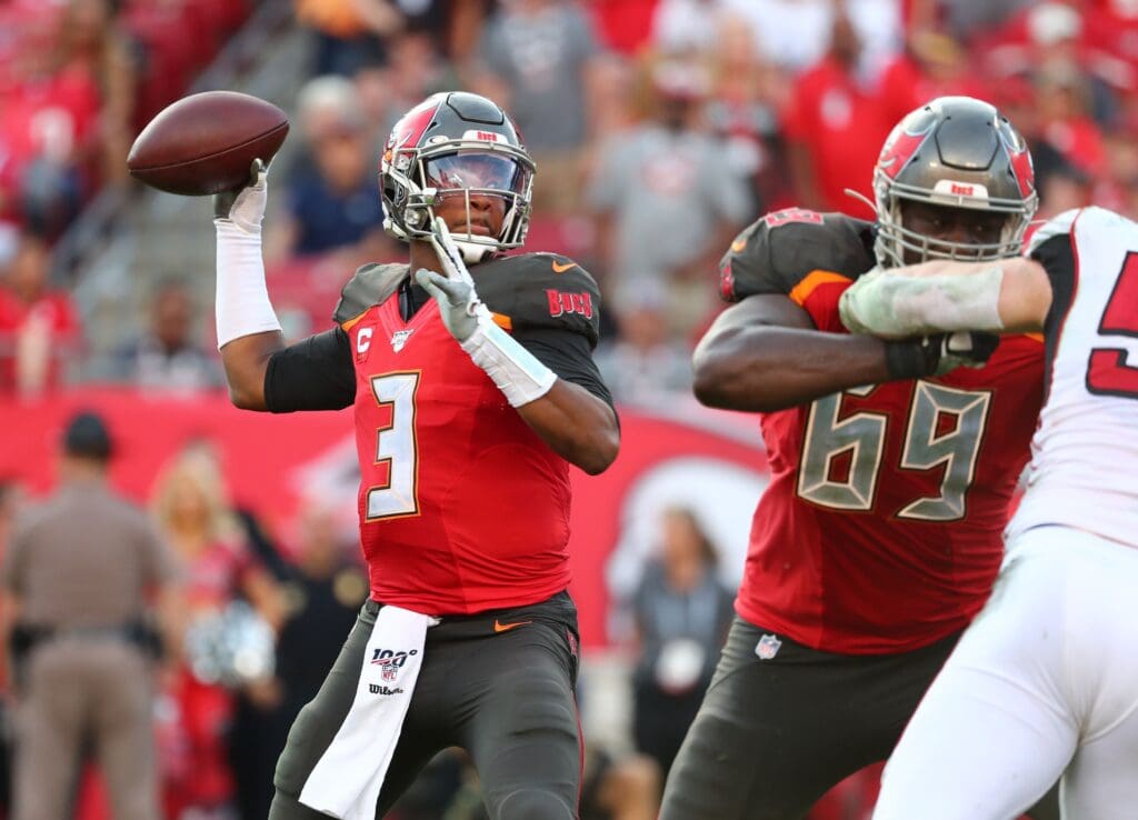 Dec 29, 2019; Tampa, Florida, USA; Tampa Bay Buccaneers quarterback Jameis Winston (3) throws the ball for an interception to end the game during overtime against the Atlanta Falcons at Raymond James Stadium