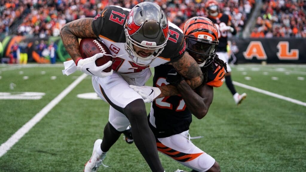Oct 28, 2018; Cincinnati, OH, USA; Tampa Bay Buccaneers wide receiver Mike Evans (13) catches a pass against Cincinnati Bengals cornerback Dre Kirkpatrick (27) at Paul Brown Stadium.