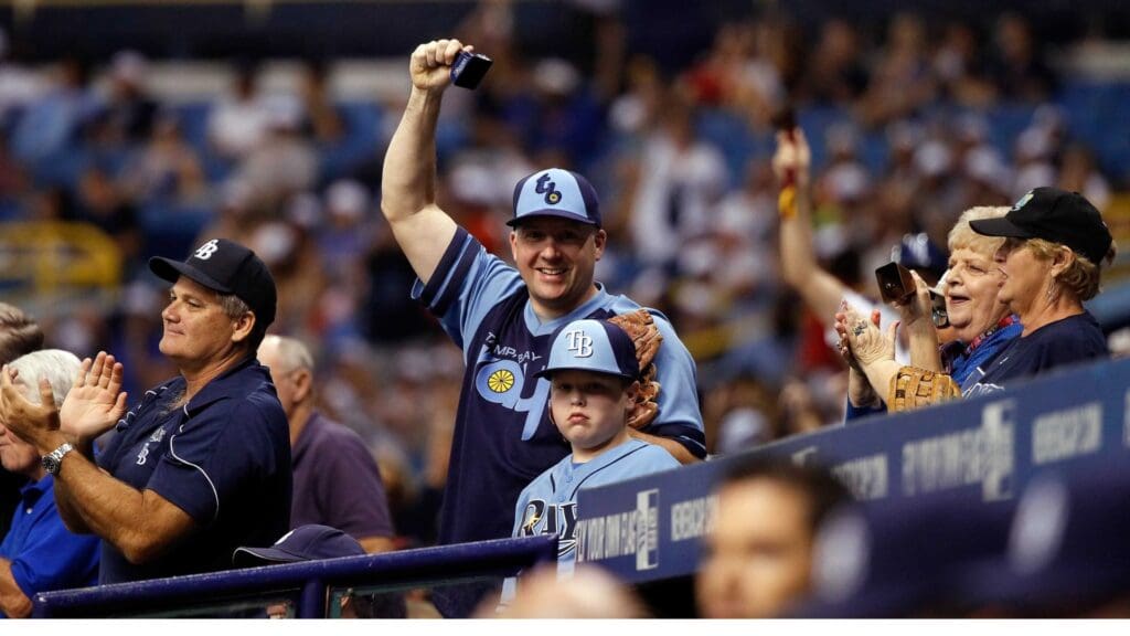 Jul 26, 2014; St. Petersburg, FL, USA; Tampa Bay Rays fans cheer during the ninth inning against the Boston Red Sox at Tropicana Field. Tampa Bay Rays defeated the Boston Red Sox 3-0.
