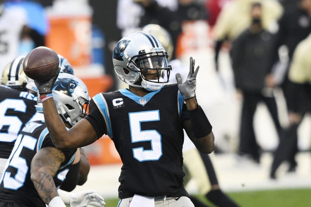Jan 3, 2021; Charlotte, North Carolina, USA; Carolina Panthers quarterback Teddy Bridgewater (5) looks to pass in the first quarter at Bank of America Stadium.