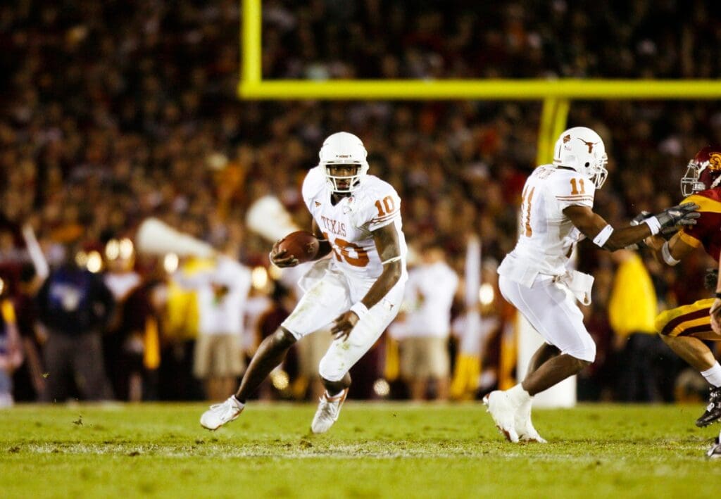 Jan 4, 2006; Pasadena, CA, USA: FILE PHOTO; Texas Longhorns quarterback Vince Young (10) in action against the Southern California Trojans during the 2006 Rose Bowl at the Rose Bowl. The Longhorns defeated the Trojans 41-38.
