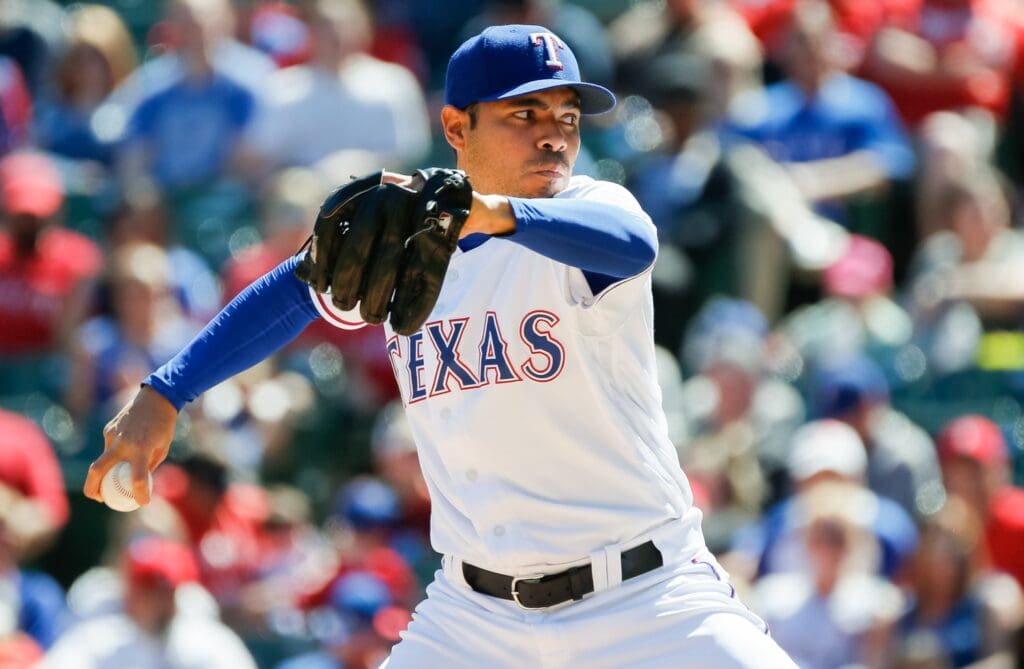 Apr 14, 2019; Arlington, TX, USA; Texas Rangers relief pitcher Jeanmar Gomez (46) throws in the sixth inning against the Oakland Athletics at Globe Life Park in Arlington.