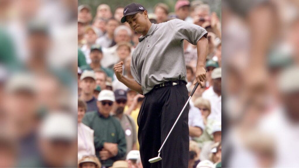 Tiger Woods reacts after sinking his fourth birdie in a row on the 10th hole in round 3 of the 2000 Masters Tournament Friday at Augusta National Golf Club in Augusta, Ga. on April 8, 2000.