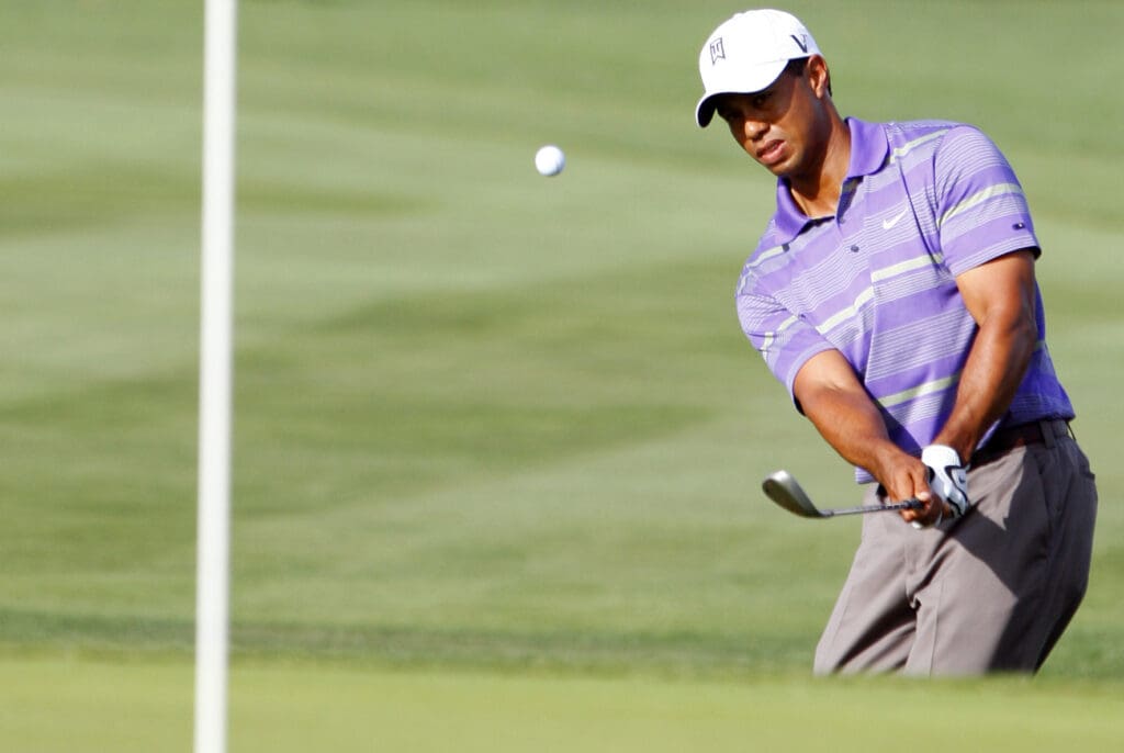 March 28, 2009; Orlando, FL, USA; Tiger Woods chips onto the sixteenth green during the third round of the Arnold Palmer Invitational at the Bay Hill Club and Lodge.