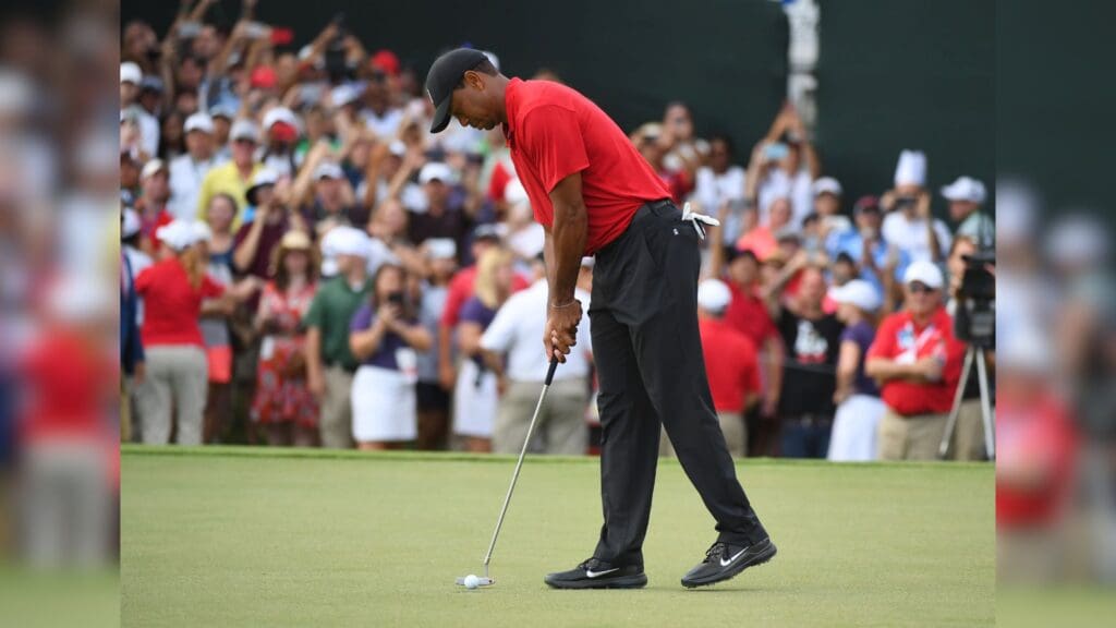 Sep 23, 2018; Atlanta, GA, USA; Tiger Woods makes his final putt to win the Tour Championship golf tournament at East Lake Golf Club.