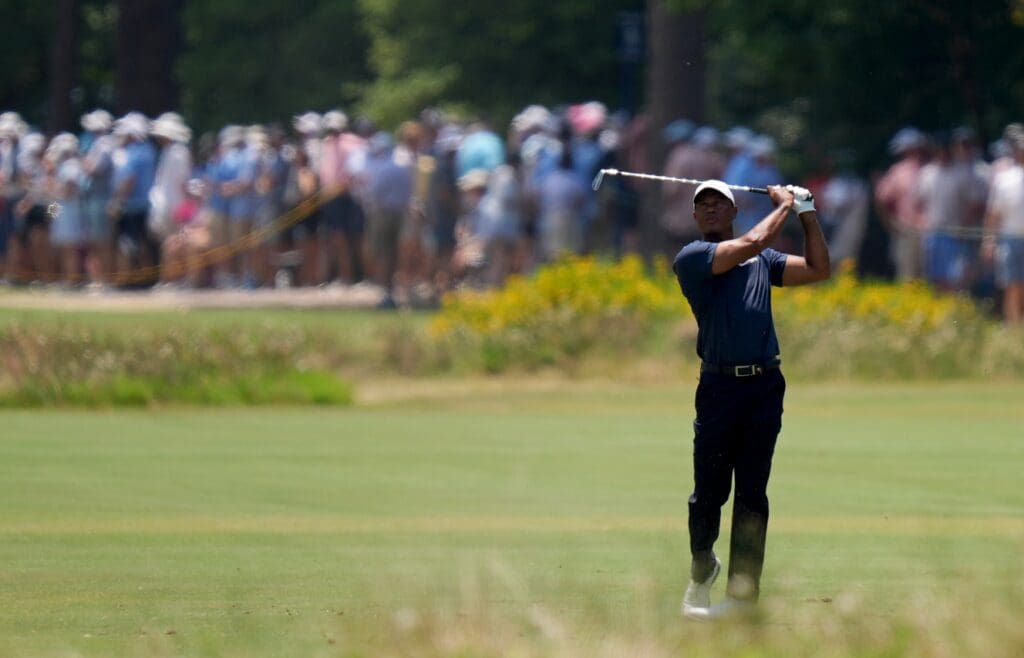 Jun 14, 2024; Pinehurst, North Carolina, USA; Tiger Woods plays on the 3rd hole during the second round of the U.S. Open golf tournament at Pinehurst No. 2.
